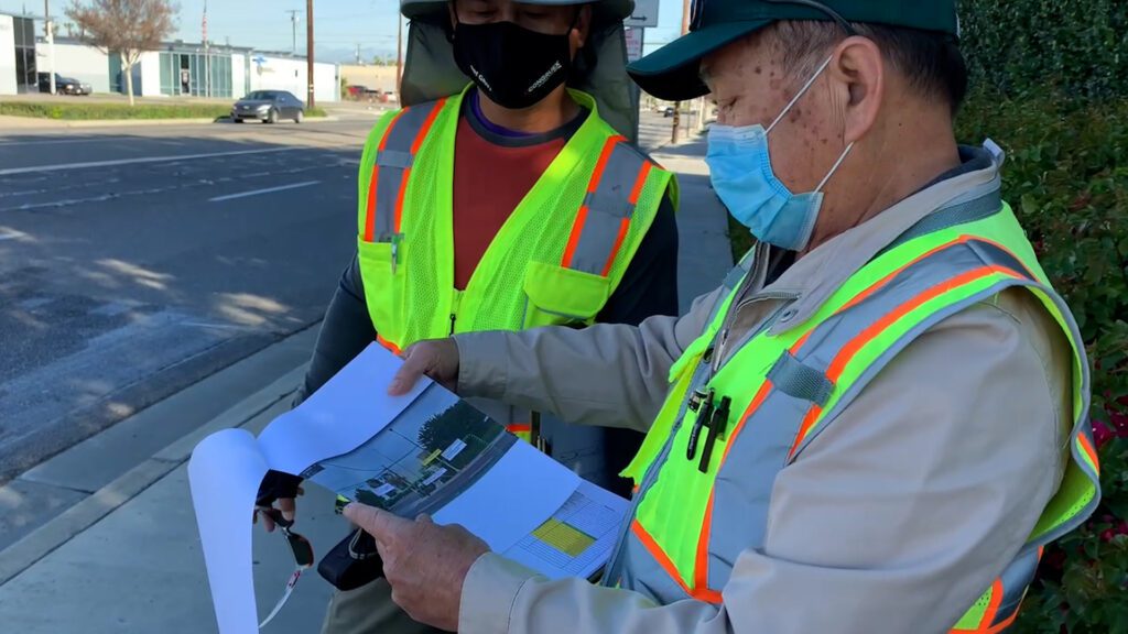 CHC Consulting Engineers In The Field Looking At Plans